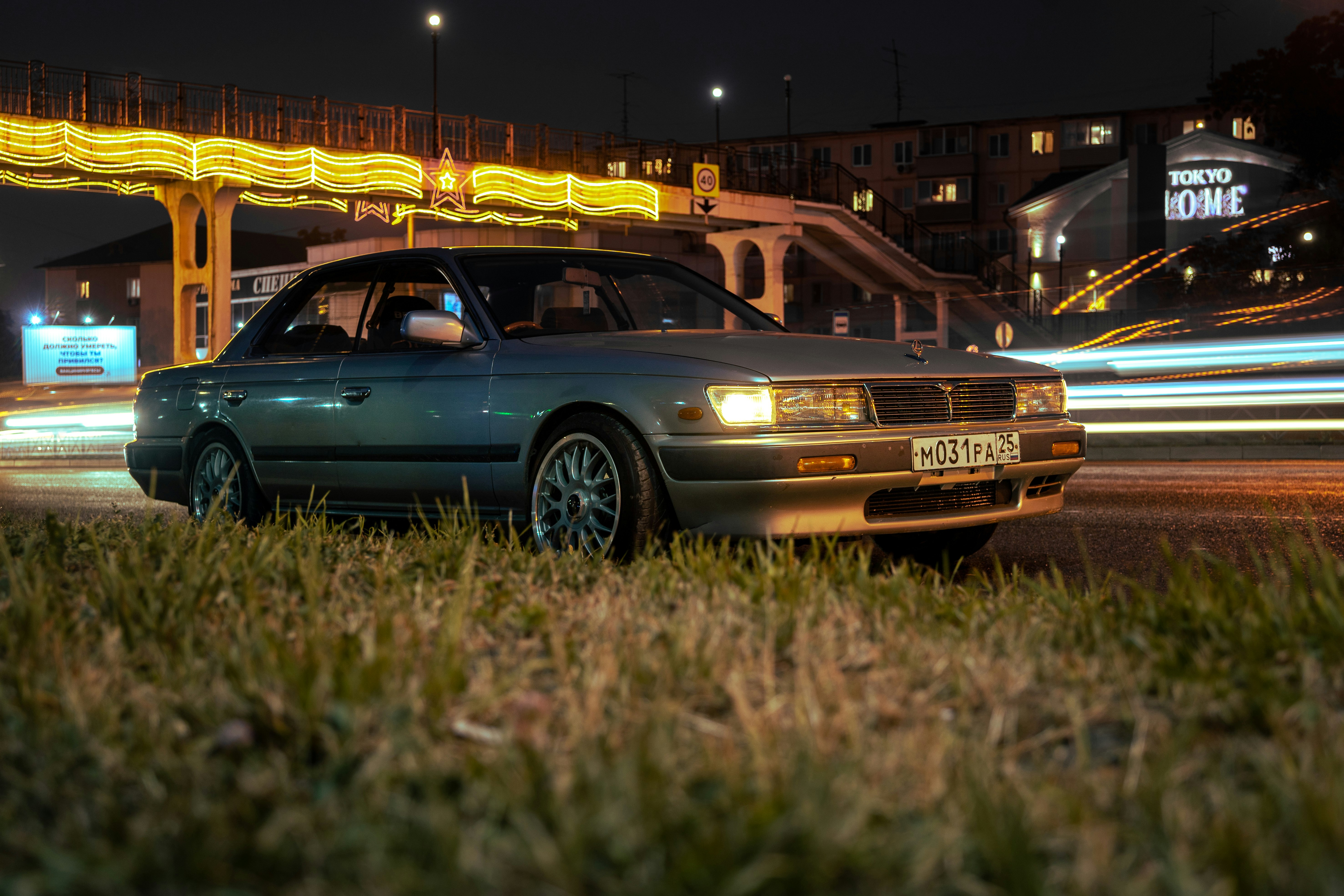 gray bmw m 3 coupe on road during night time